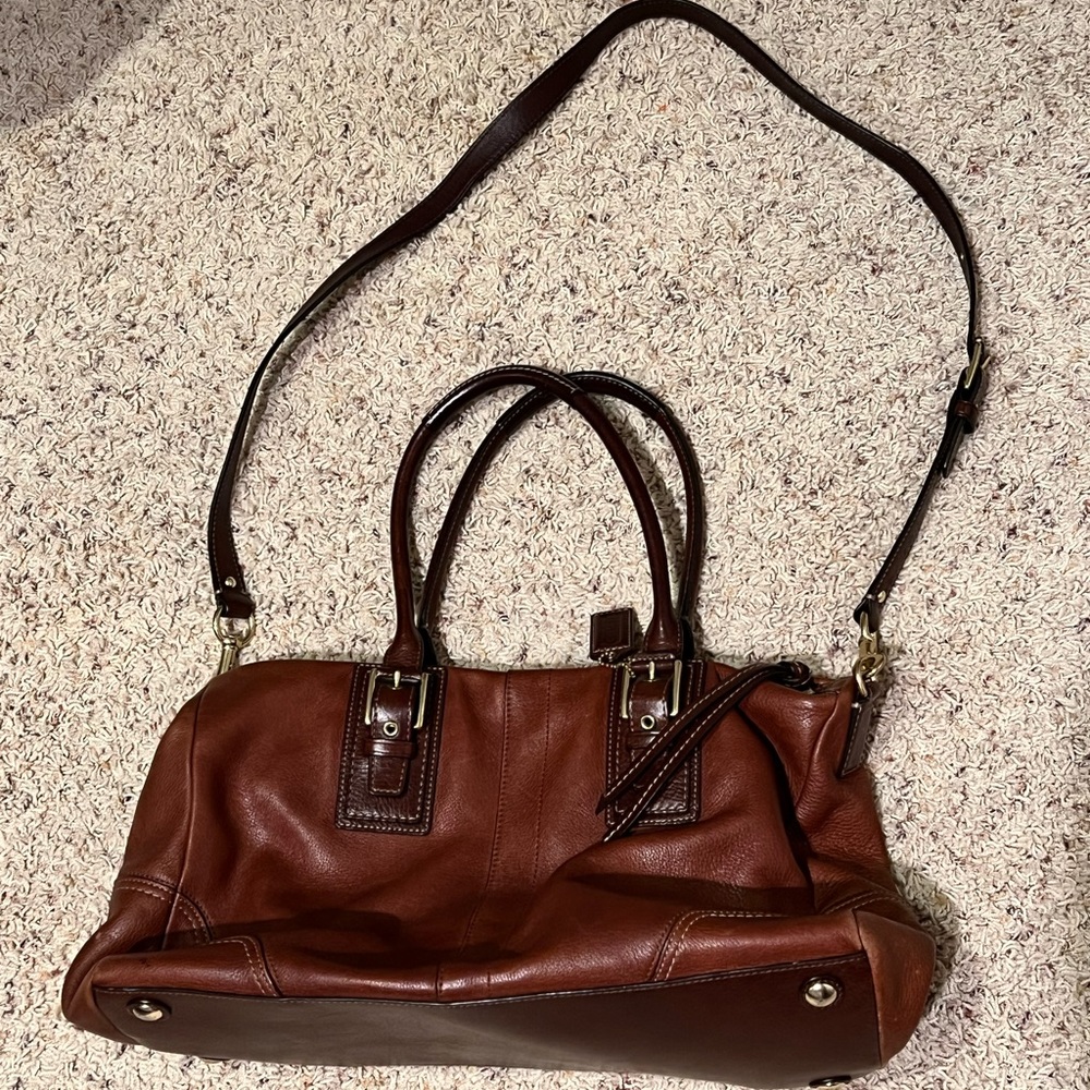 Large brown Coach bag with pink interior